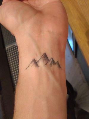 Mountains on left wrist.