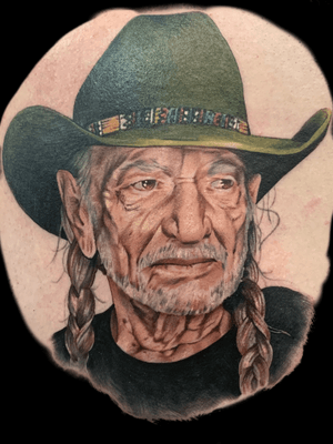 Willie Nelson color portrait on my back shoulder blade. Done by Sage Raul at the Denver Villian Arts Tattoo Convention. 