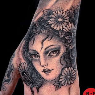 hand tattoo of Claudia de sabe #claudiadesabe #redpointtattoo #handtattoo #ladyhead #portrait #lady #flower