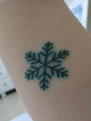 blue snowflake tattoo