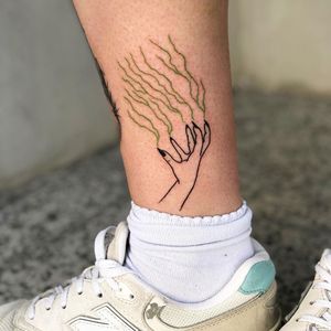 Ankle tattoo by Ruda Alina #RudaAline #ankletattoo #ankle #leg #smalltattoo #anklet #linework #hand #lightening #witchy #illustrative #green