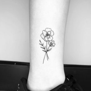 Ankle tattoo by H.j.tattoo #h.j.tattoo #ankletattoo #ankle #leg #smalltattoo #anklet #blackwork #linework #illustrative #flower #floral