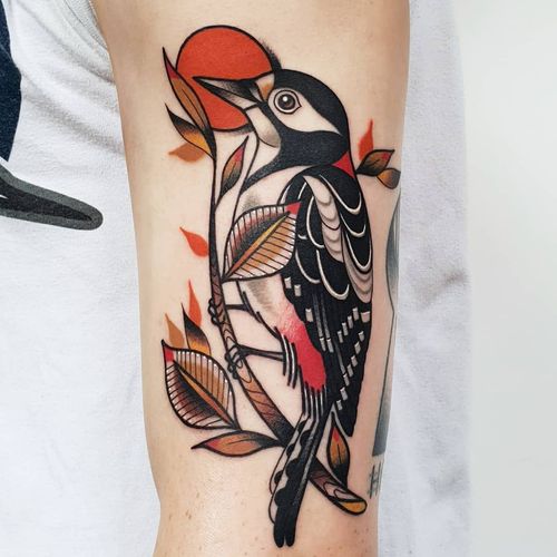 Bird tattoo by Rab Tattoo #RabTattoo #birdtattoos #birdtattoo #bird #feathers #wings #flying #tattooidea #traditional #neotraditional #leaves #sun
