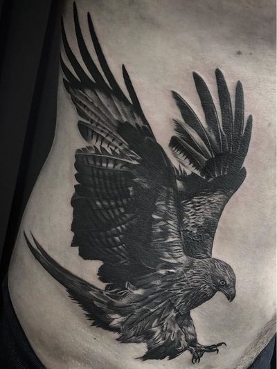 Bird tattoo by Fez Tattoo #FezTattoo #birdtattoos #birdtattoo #bird #feathers #wings #flying #tattooidea #blackandgrey #eagle #realism #realistic