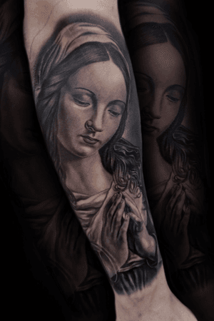 Virgen Mary, outer forearm shot.