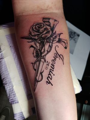 Rose with a bone cross😄 on the forearm