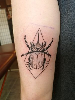 Fun beetle tattoo