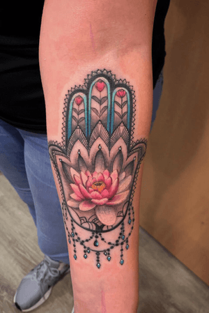 Fatimas hand and lotus flower ornamental tattoo 