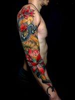 Beautiful tattoo by Leonardo Branco #LeonardoBranco #beautifultattoos #beautifultattoo #beautiful #tattooidea #besttattoo #awesometattoo #cooltattoo #sleeve #arm #lotus #snake #color #neotraditional