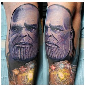 The mighty Thanos holding the Infinity Gauntlet! Done by the very talented  