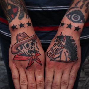 Hand tattoo by Joel Soos #JoelSoos #TattoodoApp #TattoodoApptattooartist #tattooartist #tattooart #tattooidea #inspiringtattoo #besttattoo #awesometattoo #traditional #skeleton #horse #skull #cowboy #hand