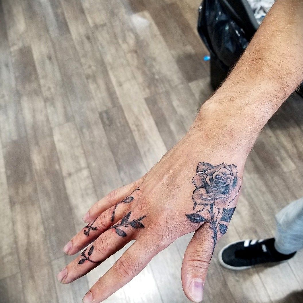 Freehand finger vine tattoo in fine line