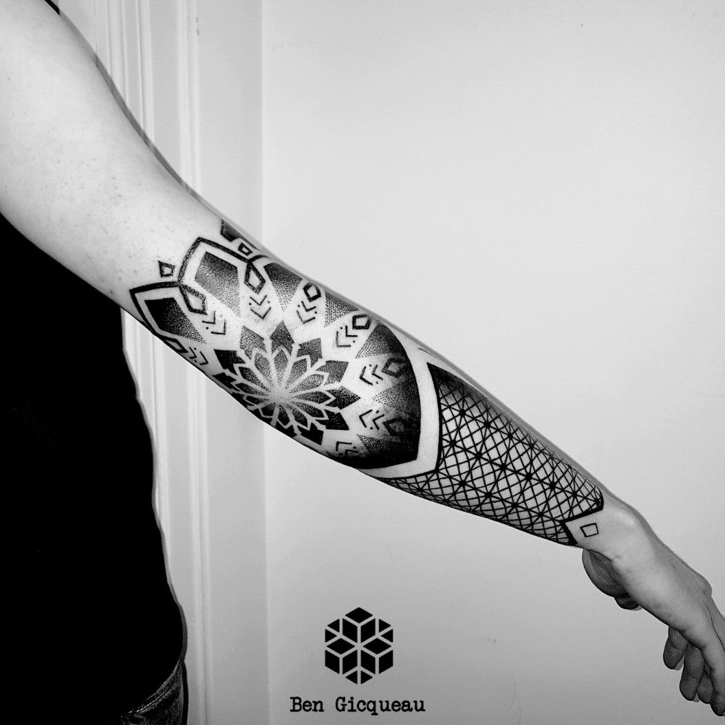 Geometric ornament tattoo above the elbow  Tattoogridnet