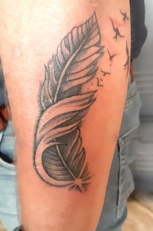 Feather on lower arm