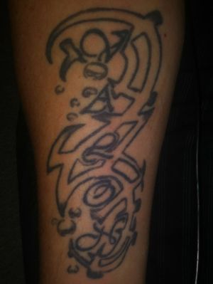 Right forarm Valon was done first then the trible was later added by same artist.