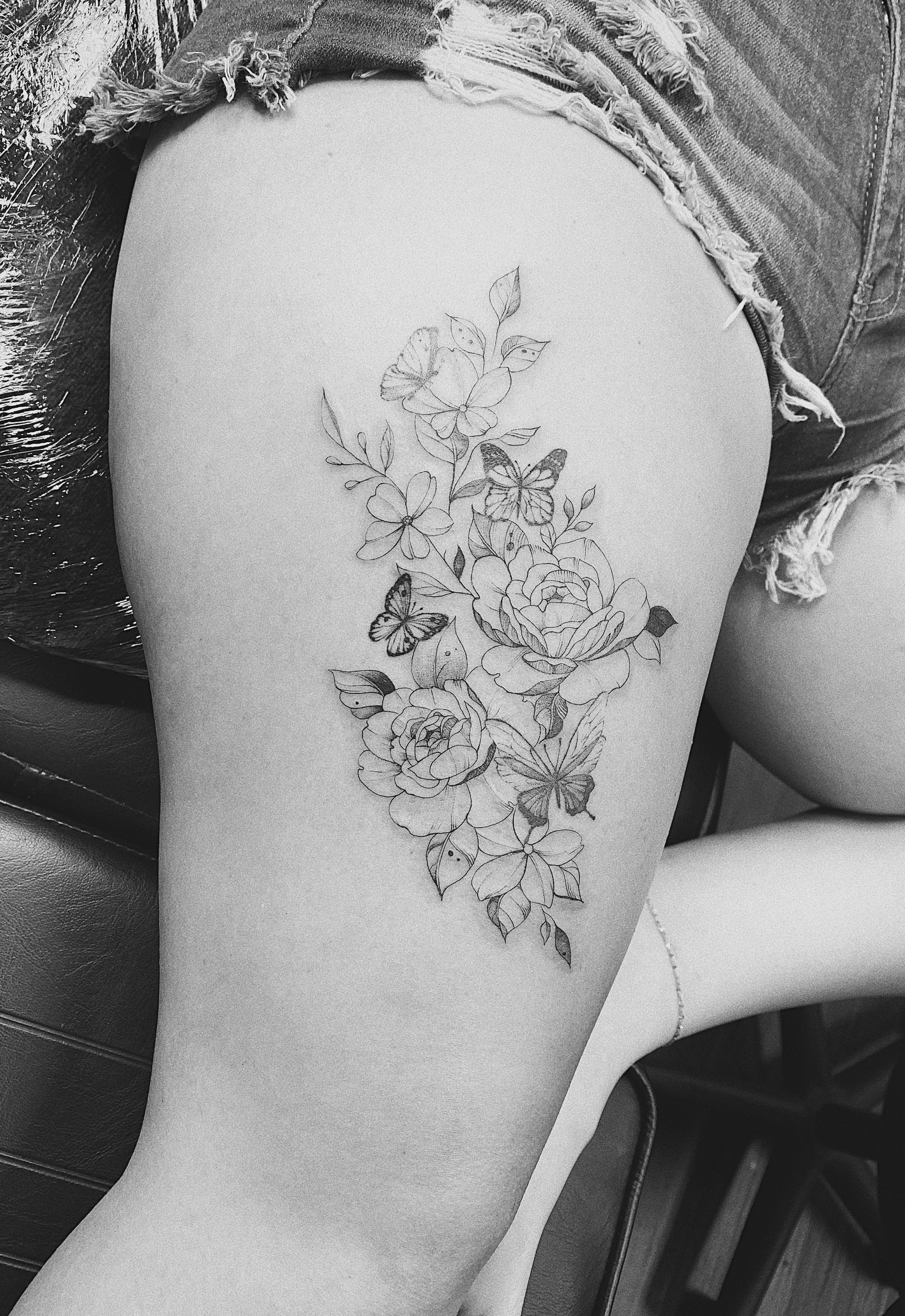 butterfly flower hip tattoos