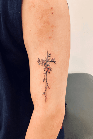 emotional color cross flower tattoo