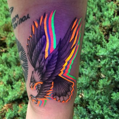 UV Ink Tattoo by Hip Hops Prayer #HipHopsPrayer #uvinktattoo #uvink #uvtattoo #ultraviolet #ultraviolettattoo #uv #eagle #bird #feathers #wings #traditional #newschool