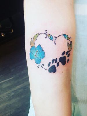 Dog memorial hibiscus heart on forearm 