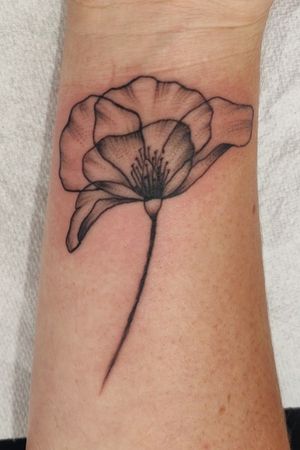 Poppy x-ray tattoo on the wrist. So delicate and feminine. 