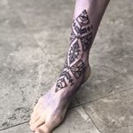 Good tattoo design by Suni Banik #SuniBanik #goodtattoodesigns #goodtattoodesign #tattoodesign #besttattoo #tribal #linework #dotwork #cyber #foot #lowerleg #leg #shapes #sacredgeometry