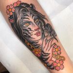 Good tattoo design by Gem Carter #GemCarter #goodtattoodesigns #goodtattoodesign #tattoodesign #besttattoo #color #cherryblossom #flower #floral #lady #catwoman #cat #kitty #ladyhead #arm