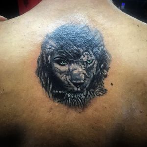 Lion woman face tattoo 