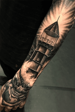 On the bottom of my left forearm i would like a detailed loghthouse that maybe connects to heaven in someway. Its for my grandmother who passed away on Occtober 10th 2016 and she loved light houses and trying to find the right design for my forearm to represent that. She was really special in my life so it would have to be a really special tattoo