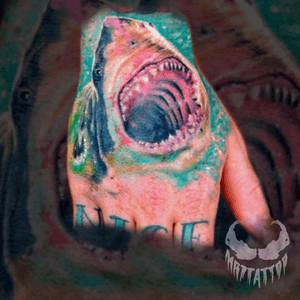 Shark hand tattoo