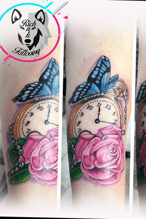 Timepiece,butterfly and rose