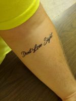"Dont lose sight" on forearm 