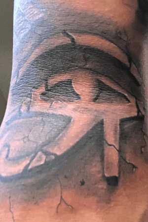 Eye Of Horus in the crook of the arm. 