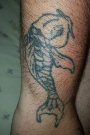 My koi fish drew it my self.Had orange an pink scales but some color gas faded over the years.Would love to get it re colored.