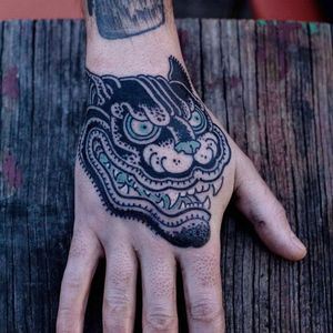 Best Tattoodo App tattoo by Damien J Thorn #DamienJThorn #TattoodoApp #TattoodoApptattooartist #tattooartist #tattooart #tattooidea #inspiringtattoo #besttattoo #hand #darkart #panther #japanese