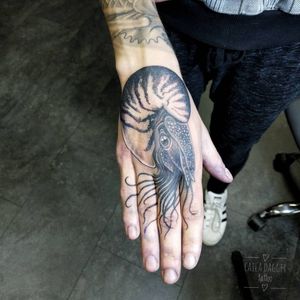 Best Tattoodo App tattoo by Caila Dagger #CailaDagger #TattoodoApp #TattoodoApptattooartist #tattooartist #tattooart #tattooidea #inspiringtattoo #besttattoo #illustrative #hand #Mollusk #nautilus