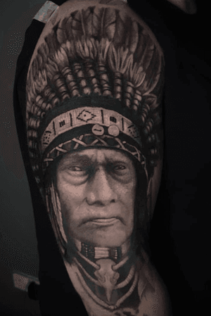 Indian chief by @hobotattoo. Face is healed, head dress is fresh