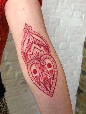 Ornamental tattoo by Courtney Lloyd #CourtneyLloyd #FemmeFatale #Traditionaltattoo #GirlyTraditional #Traditional #newschool #color #tattooartist #London #UK #ornamental #redink #linework #dotwork #pattern #arm