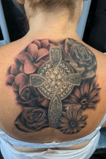 Added flowers to this back (Cross not done by me) #backtattoo #celtic #rose #daisy #realism #realistic