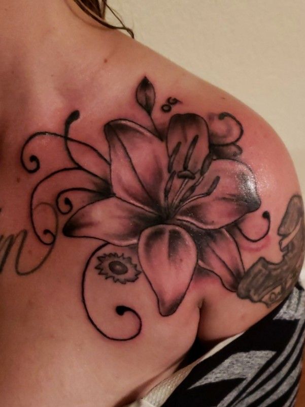 Shoulder Linework Lily tattoo at theYoucom