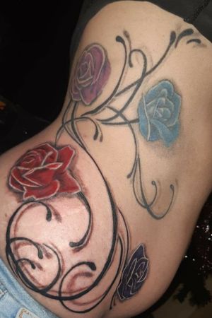 Paul Weston (my favourite & MY CHOSEN TATTOOIST FOR THE REST OF MY TATTS) Paul Weston did the colouring of the roses only. 