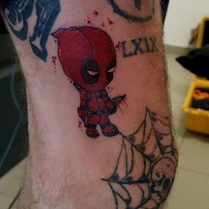 What would little deadpool do?🤣🌶 carved this little fella into the leg a while back. 