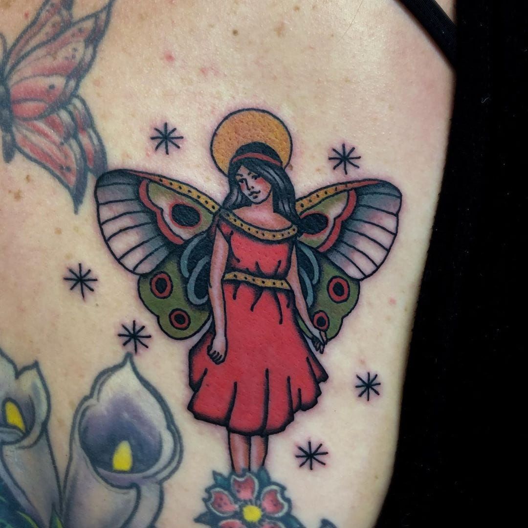 Tattoo uploaded by Tattoodo • Fairy tattoo by Igor Puente #IgorPuente #fairytattoo #fairytattoos #fairy #wings #magic #folklore #fairytale #color #traditional #moon #star #butterflywings #arm • Tattoodo