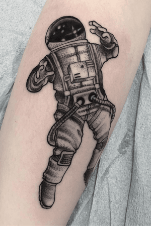 Astronaut black dot work tattoo