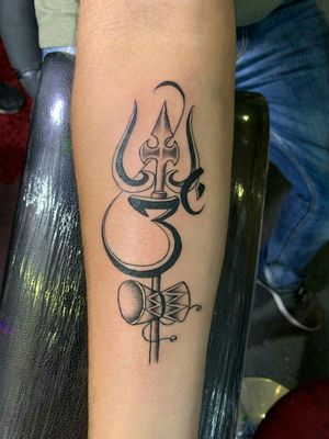 Om with Trishul....Did this few days back..To book appointment call now 7973316932