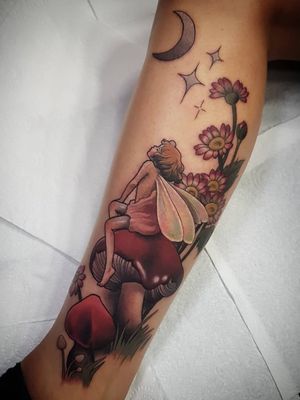 Fairy tattoo by Cori Henderson #CoriHenderson #fairytattoo #fairytattoos #fairy #wings #magic #folklore #fairytale #color #leg #neotraditional #flower #floral #mushroom #moon #stars