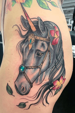 Neotraditional illustrative unicorn tattoo color