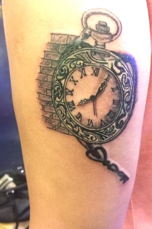 Clock with bricks tattoo