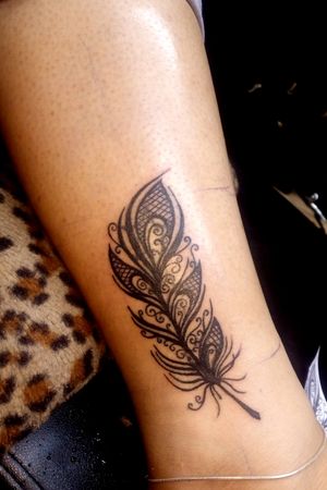 Feather tattoo cover-up