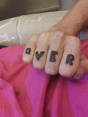 OVER on my knuckles the o looks like a Q but it can be fixed bones coming later.