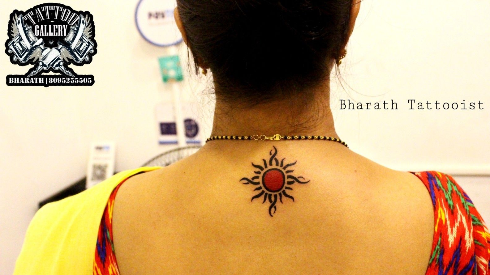 Tattoo of Suns Om Tribal
